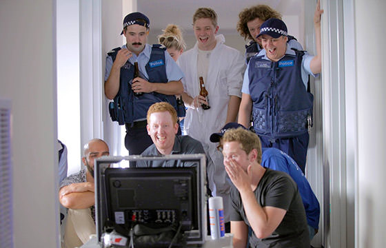 The cast and crew review a shot. From left to right: Mike Nayna, Stuart Daulman, Luke McGregor, Maggie Looke, Jay Morrissey, Nick Capper, Geraldine Hickey, Jonathan Schuster and John Campbell.
