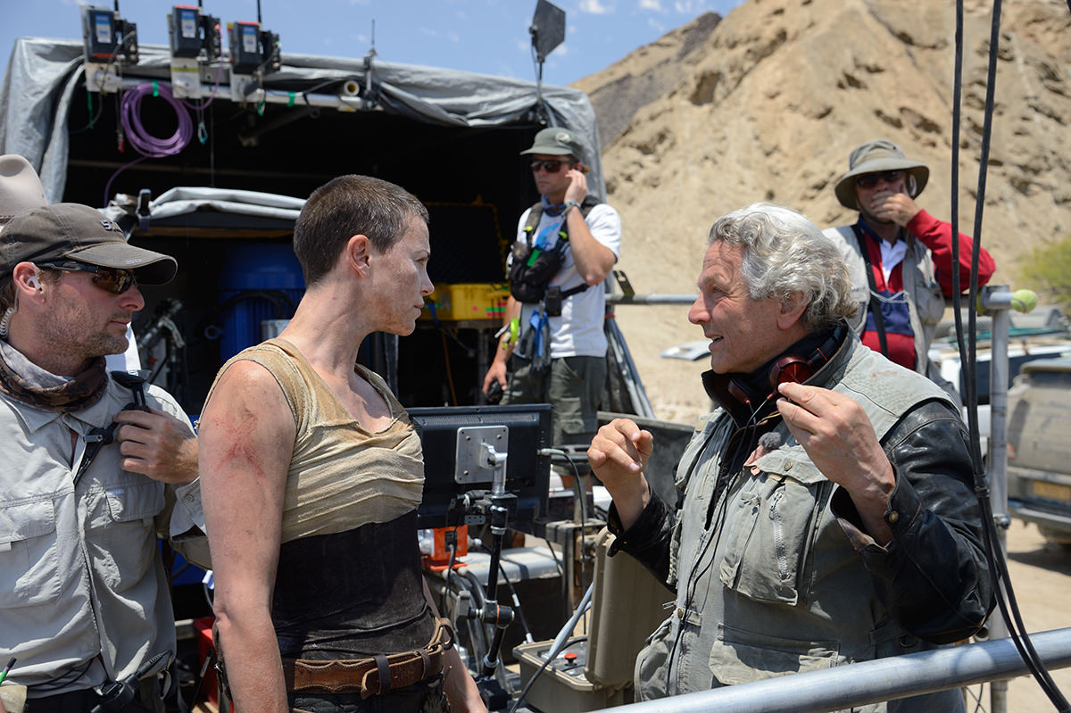 Charlize Theron and George Miller on location during filming for Mad Max: Fury Road. Supplied by Village Roadshow.